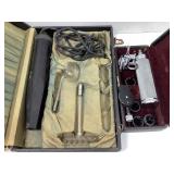 Two cases of very old doctors tools and one is