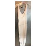 A long white sleeveless scoopneck, body con maxi