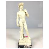 a vintage miniature reproduction figurine of