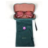 Gucci, sunglasses and hardshell case with Gucci
