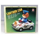 Cartoon car, titled animals police with a bear as