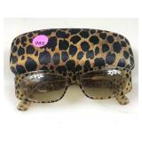 Dolce and Gabbana leopard print sunglasses in a