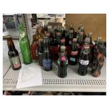 Assorted Coca Cola Bottles & More. Mostly Full