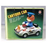 Cartoon car, titled animals police with a bear as