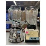 2 Osterizer Blenders.