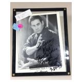 An autograph picture to Larry best wishes,