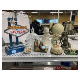 Vintage Musical Carousel, LV Sign, Figurines, and