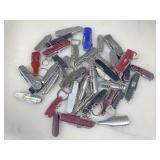 Assorted used pocket knives and some are multi
