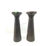 Tapered pillar, candleholders, resembling studio