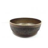 Ceramic pottery bowl with an earthy brown