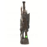 Hand carved wooden sculpture, likely an