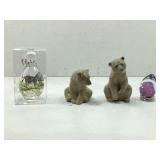 Four unique items, a teardrop shaped glass bottle