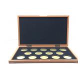 Thin wooden display case with 14 round 1 inch and