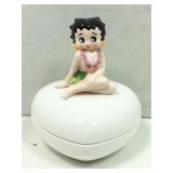 Small ceramic Betty Boop dressed for a luau and