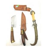 A pair of small fixed blade hunting or utility