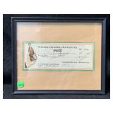 A vintage 1941 check and advertisement from the