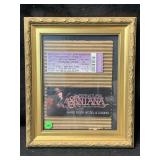 A framed vintage concert ticket stub and promo