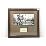 The framed black and white photograph is titled