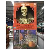 Spooky Village LED Pose n Stay Skeleton in box,