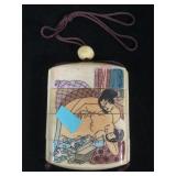 Carved bone Asian pill box with erotic scenes -