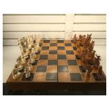 Vintage carved ivory chess set with wooden