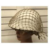 US military helmet with net cover - marked inside