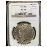 1923  NGC MS62 Leopard Tone Silver Peace Dollar