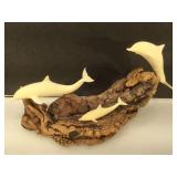 John Perry dolphins statue - composite on wood -