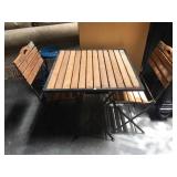Metal folding patio table with 2 folding chairs -