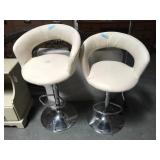 Pair of modern white and chrome bar stools -