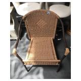 Metal and faux wicker patio chair