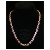 Sterling necklace w/ 50 Rubies & 700 Colorless