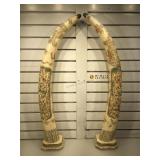 Large bone scrimshaw overlay tusks, each measures