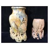 2 carved stone vases, largest stands approx 5 1/4