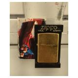 Brand new Zippo lighter plated gold, w/ original