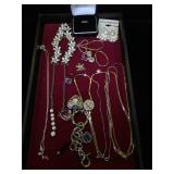 Assortment of fashion jewelry, necklaces,