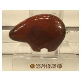 Carved stone chestnut jasper bear figurine,