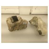 Naturally formed pyrite cubes in stone