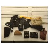 Lot of pistol holsters and more