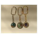 3 gemstone globe keychains