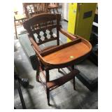 Antique wood high chair with cane seat