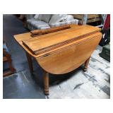 Antique drop leaf table with 2 leaves and 5th leg