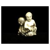 Signed Ivory scrimshaw netsuke, approx 1 1/2 x 2