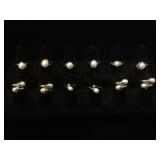 12- Genuine Pearl rings, various sizes