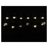 12- Genuine Pearl rings, various sizes