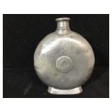 1895  pewter footed flask with screw on cap,