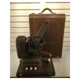 Revere 16 mm sound film projector, Art Deco case