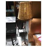 Metal base floor lamp with beaded shade