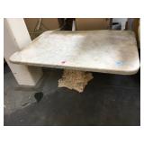 Marble top coffee table with plaster pedestal