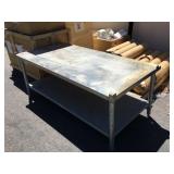 2 ft tall metal table, approx 30x60 inches